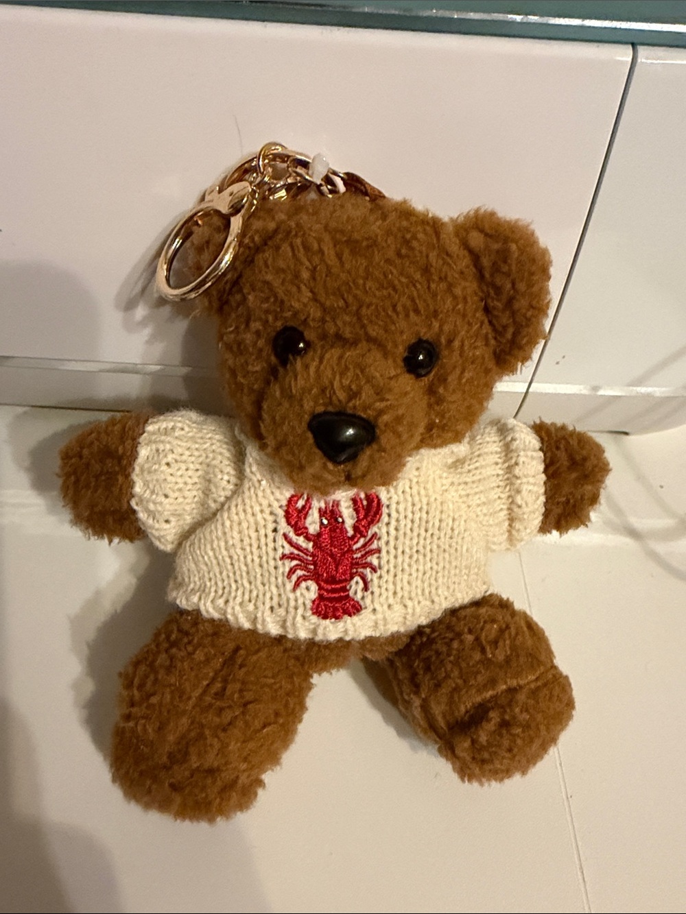 Brown Teddy Bear Keychain with Cream Sweater and Red Lobster